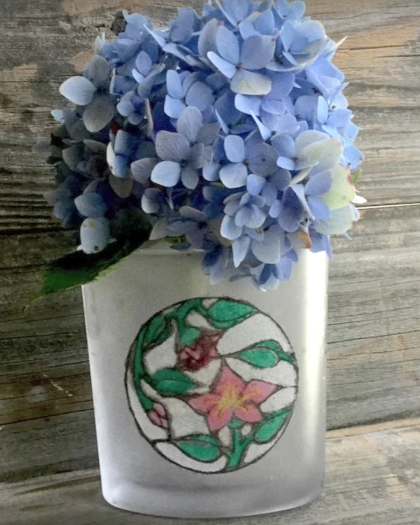 Use colored sand and etching cream to create a beautiful Etched Sand Art vase!  This video tutorial shows you just how to do it!